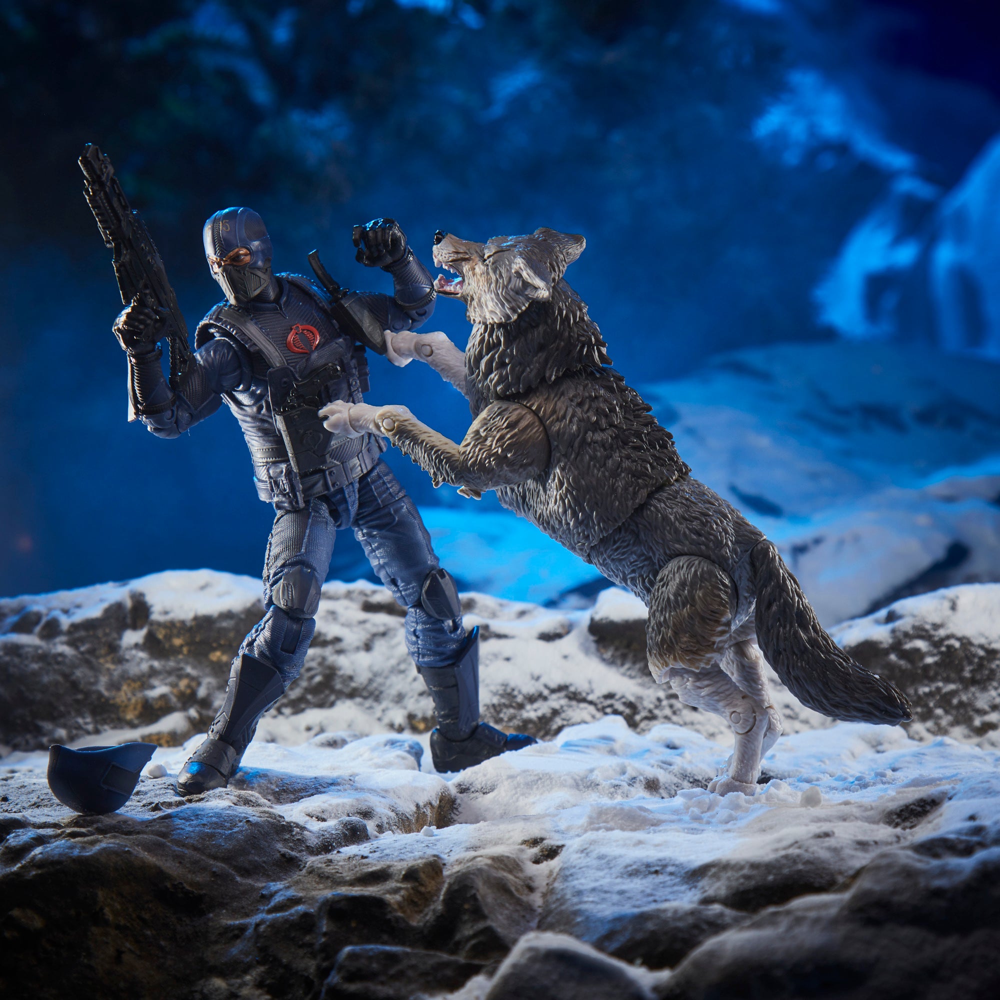 G.I. Joe Classified Series Snake Eyes standing on snowy rocks holding knife in winter diorama