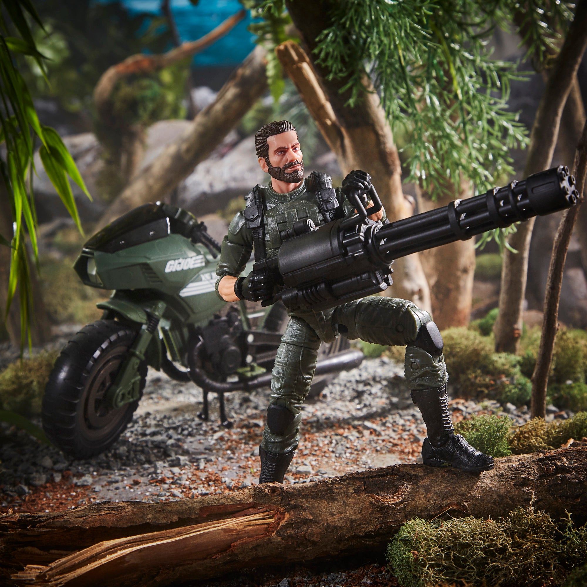 G.I. Joe Classified Series Breaker crouching in jungle diorama wielding minigun with RAM Cycle