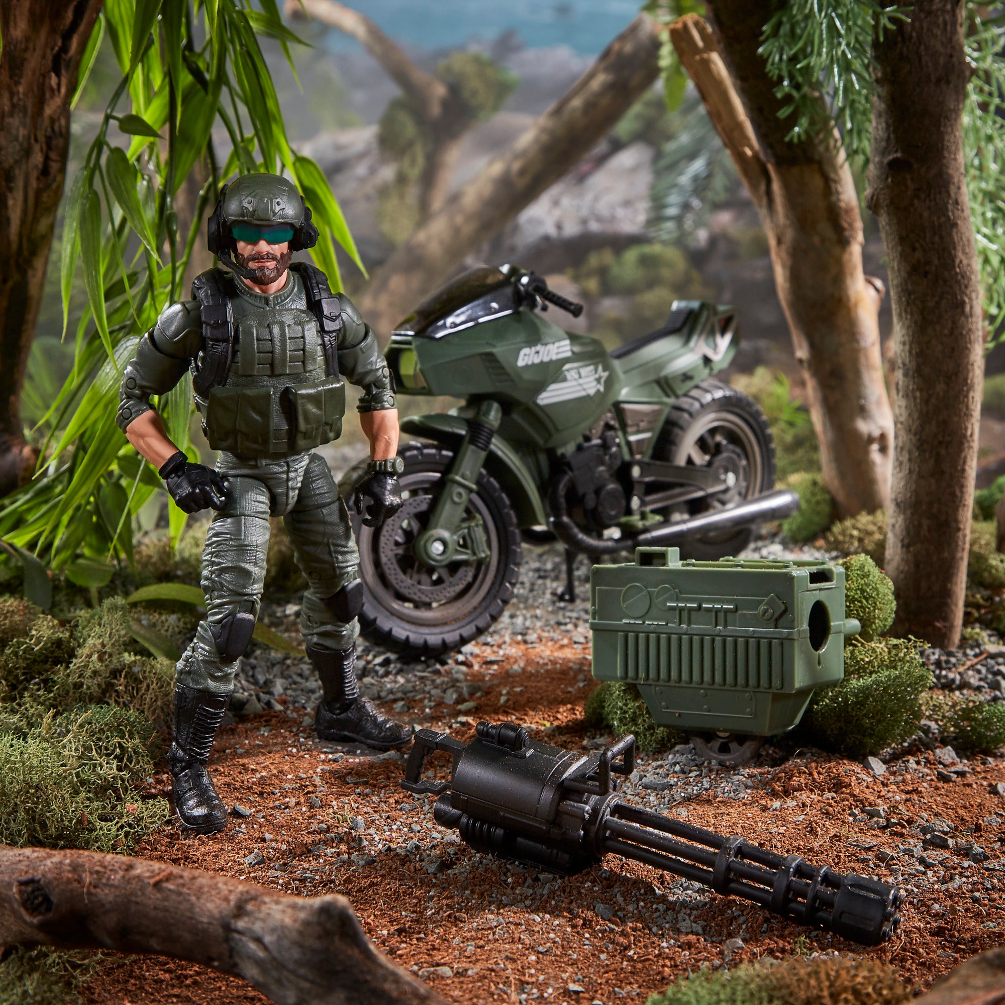 G.I. Joe Classified Series Breaker standing in jungle diorama with minigun and RAM Cycle behind