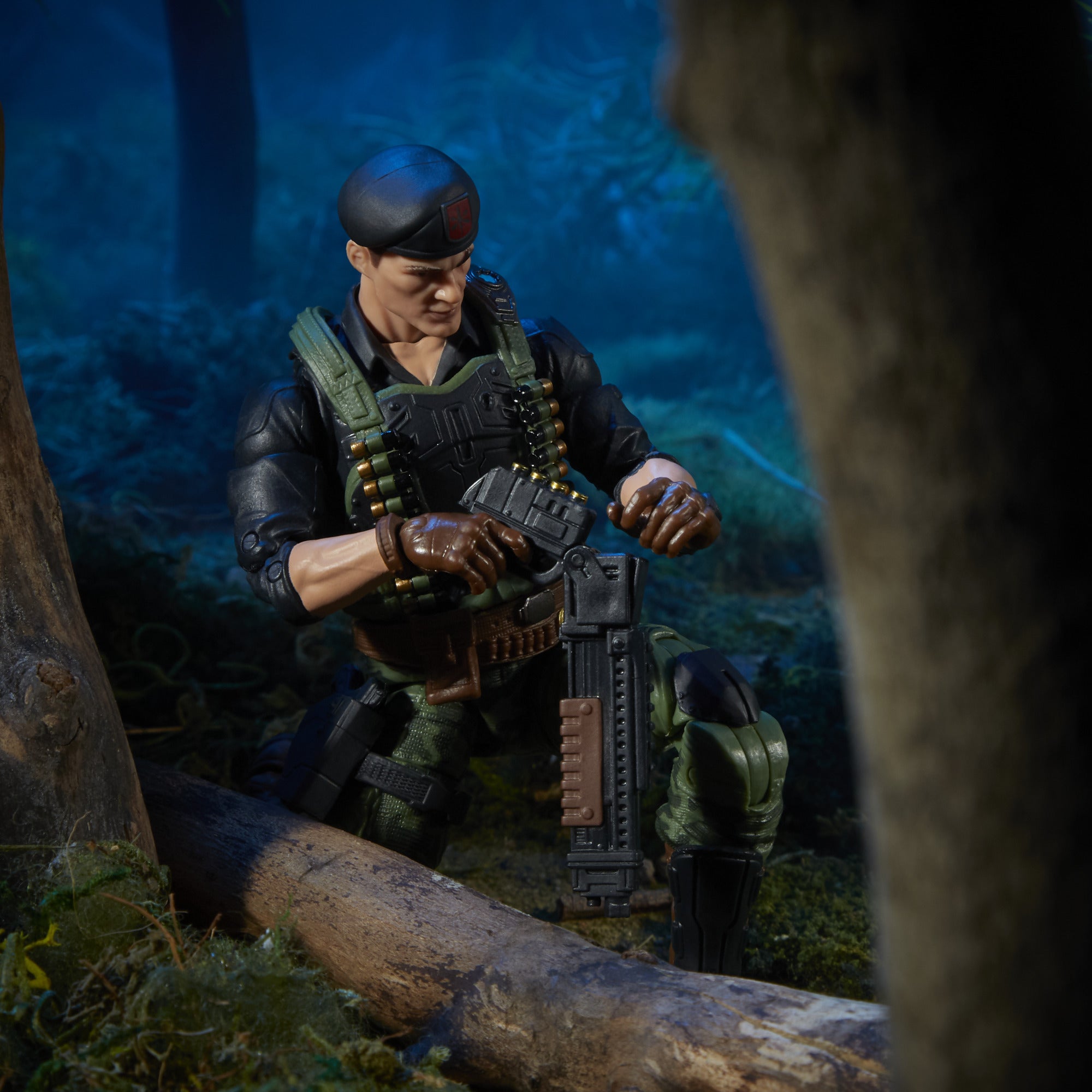 G.I. Joe Classified Series Flint crouching in jungle diorama with rifle