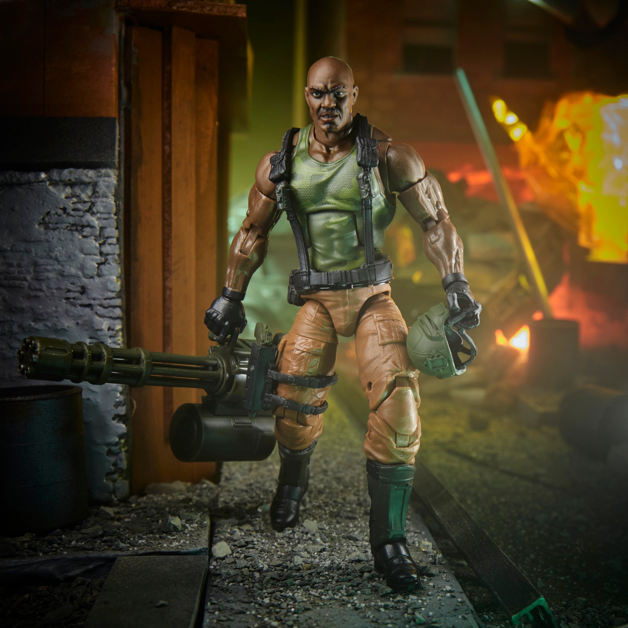 G.I. Joe Classified Series Heavy Artillery Roadblock leaning on barrel in urban diorama with helmet