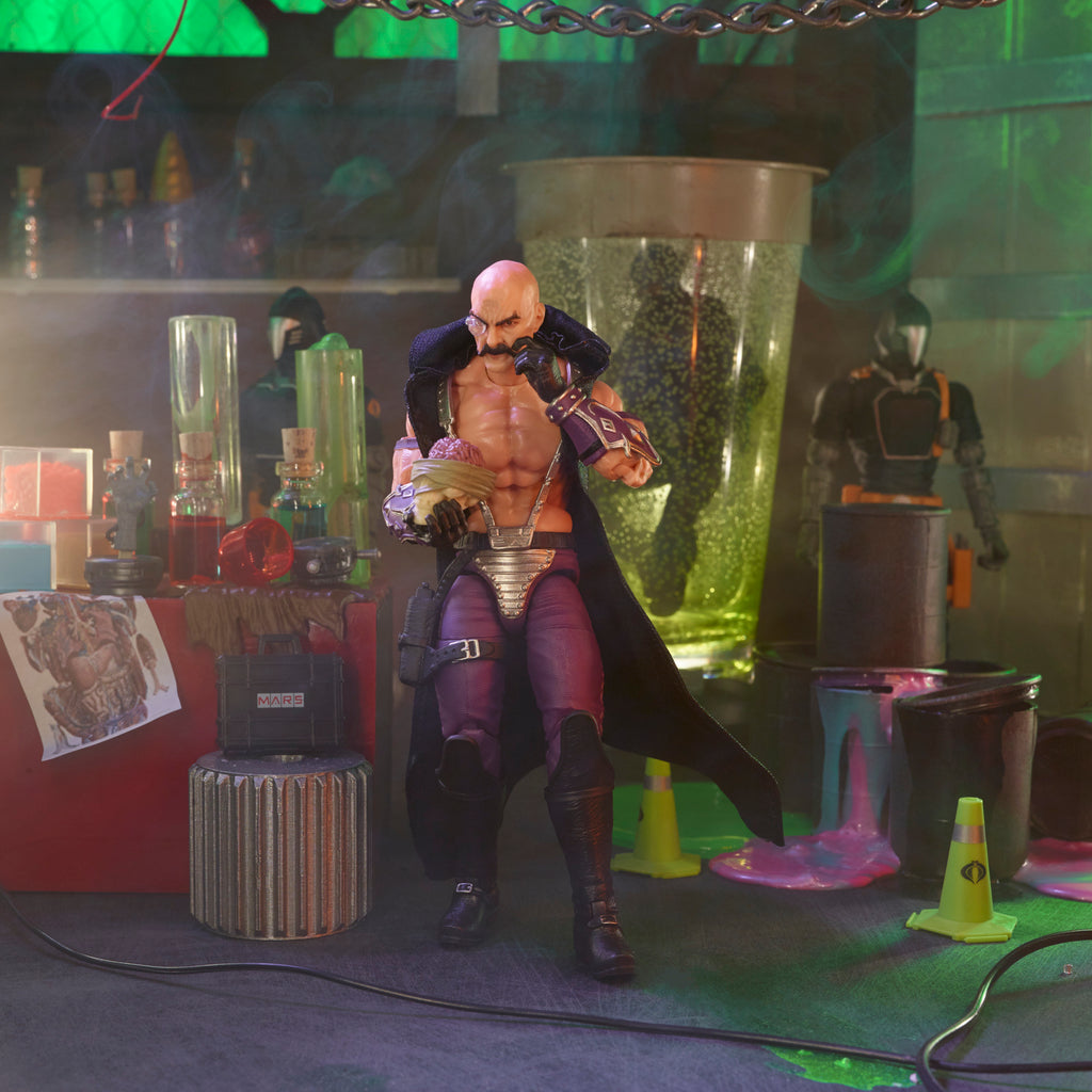 G.I. Joe Classified Series Dr. Mindbender standing in M.A.R.S. lab diorama holding brain specimen and staff with purple lighting
