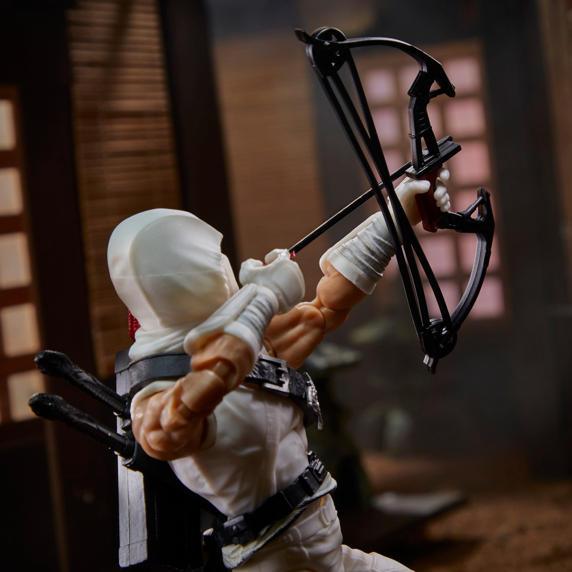 G.I. Joe Classified Series Storm Shadow rear view drawing compound bow on rooftop diorama