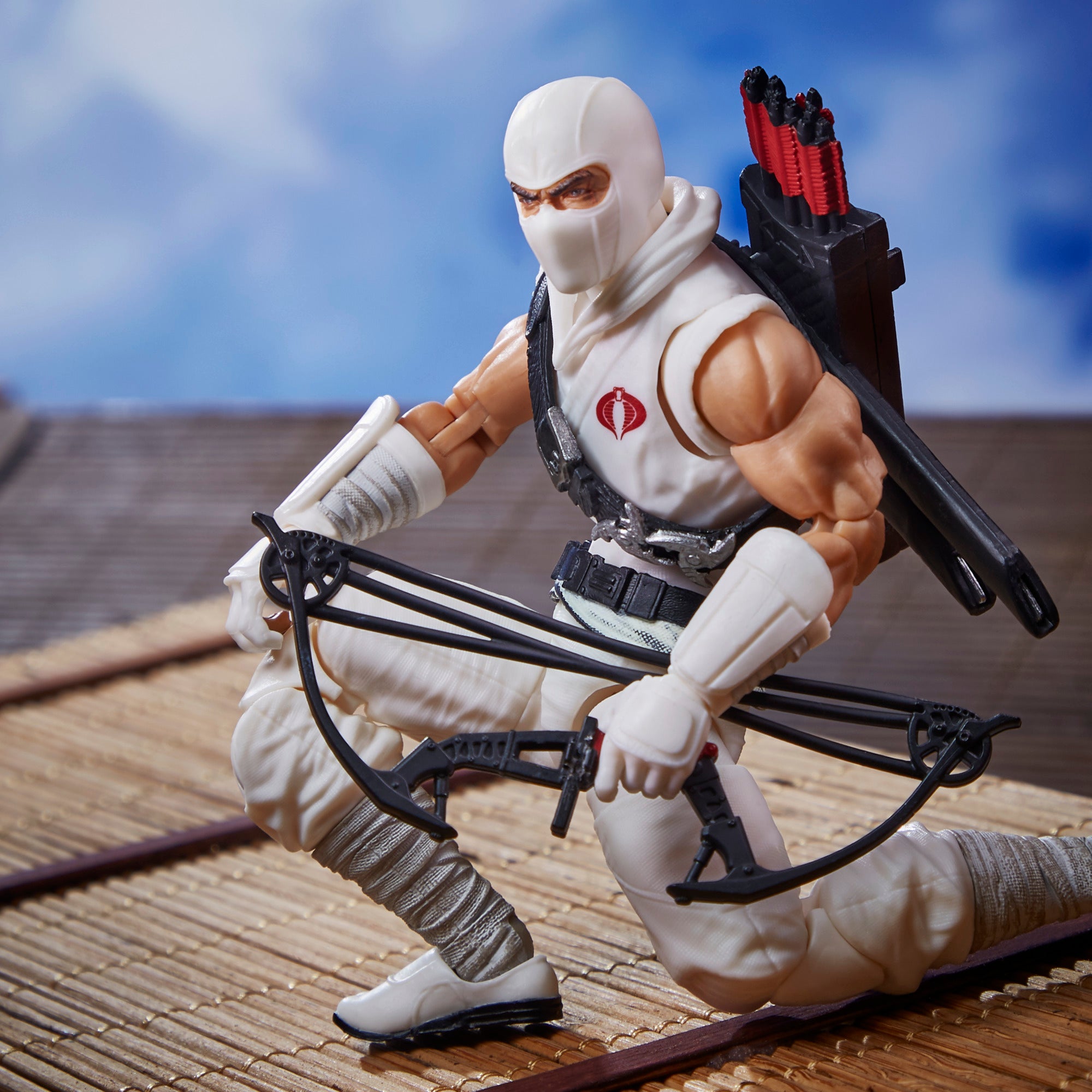 G.I. Joe Classified Series Storm Shadow crouching on rooftop aiming crossbow with quiver on back