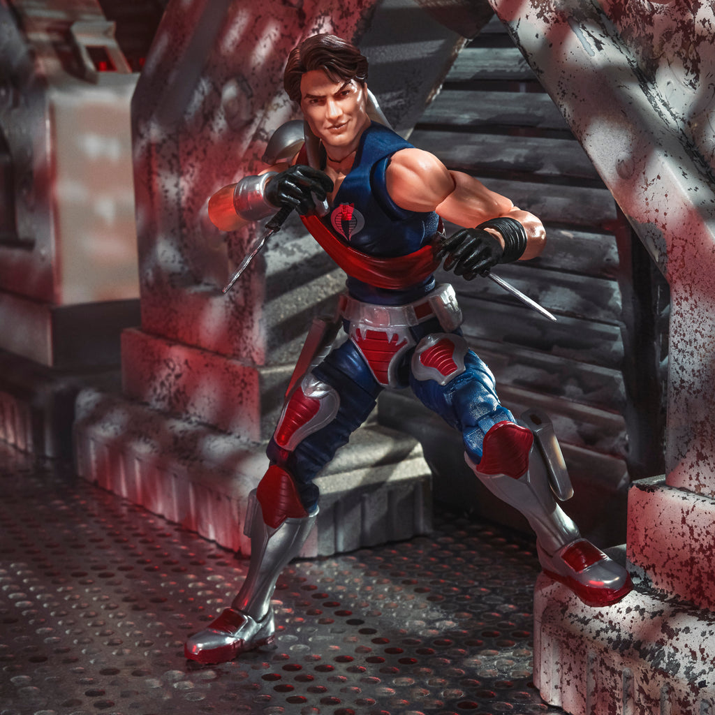 G.I. Joe Classified Series Tomax Paoli crouching on Cobra corridor stairs dual-wielding daggers in combat stance