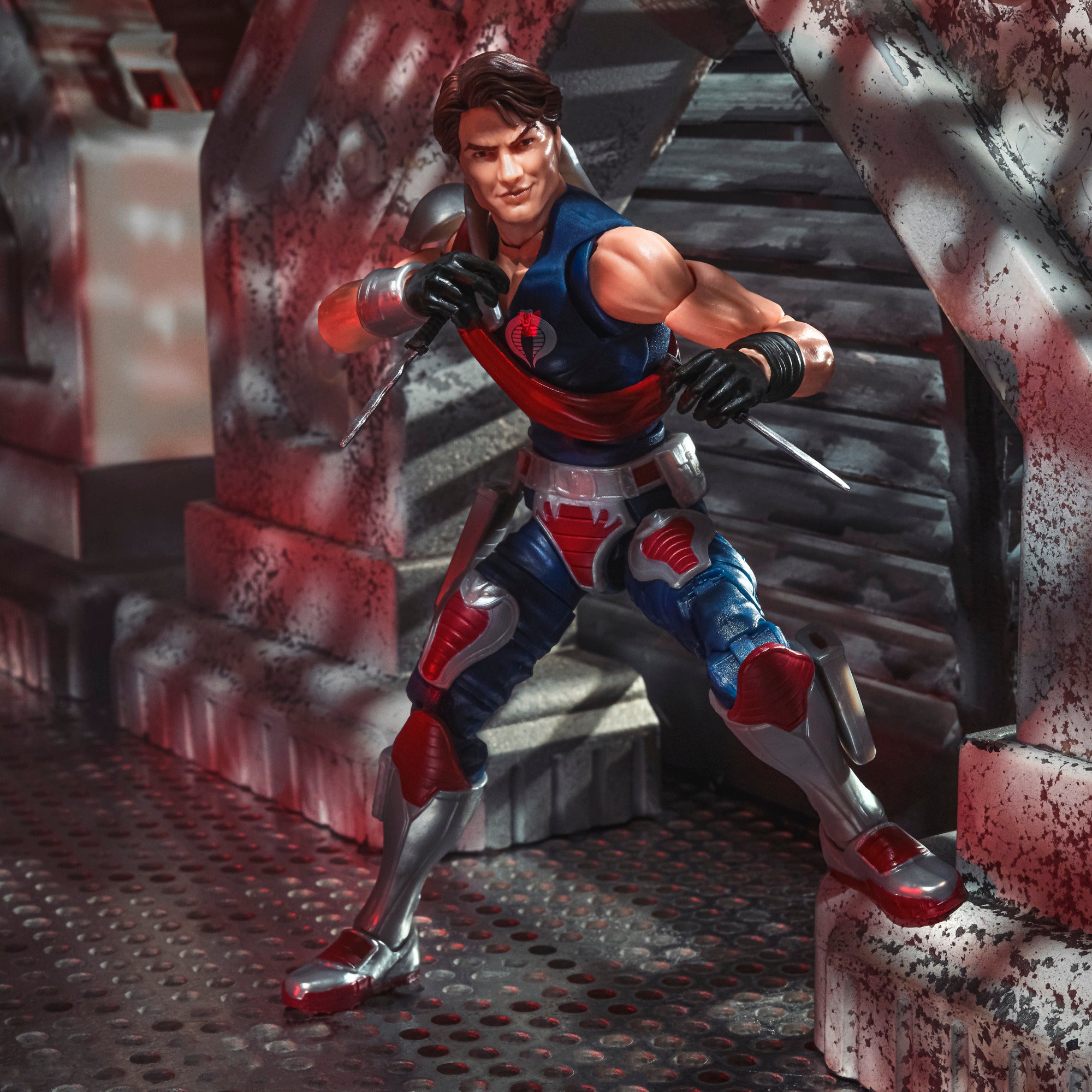 G.I. Joe Classified Series Tomax Paoli crouching on Cobra corridor stairs dual-wielding daggers in combat stance