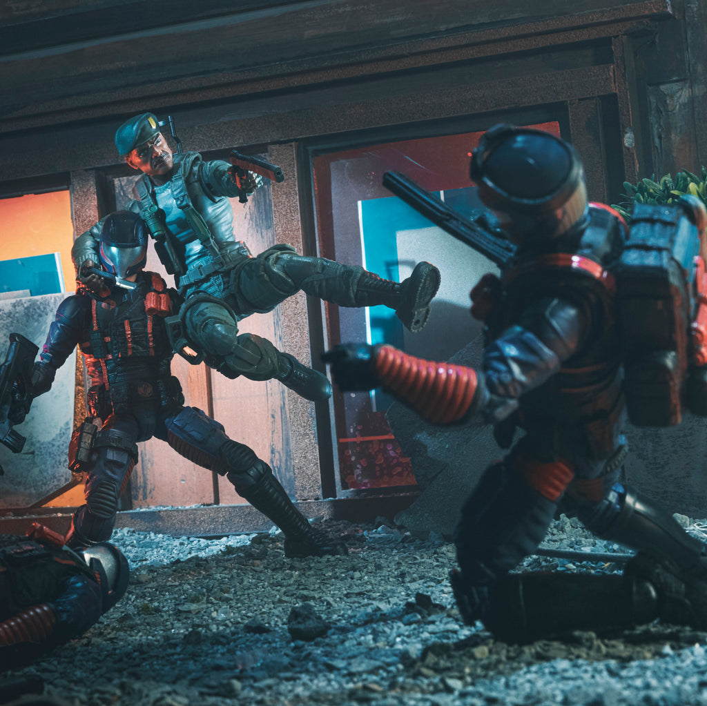 G.I. Joe Classified Series Stalker Wilkinson kicking Cobra trooper in urban combat diorama with second Cobra trooper in background