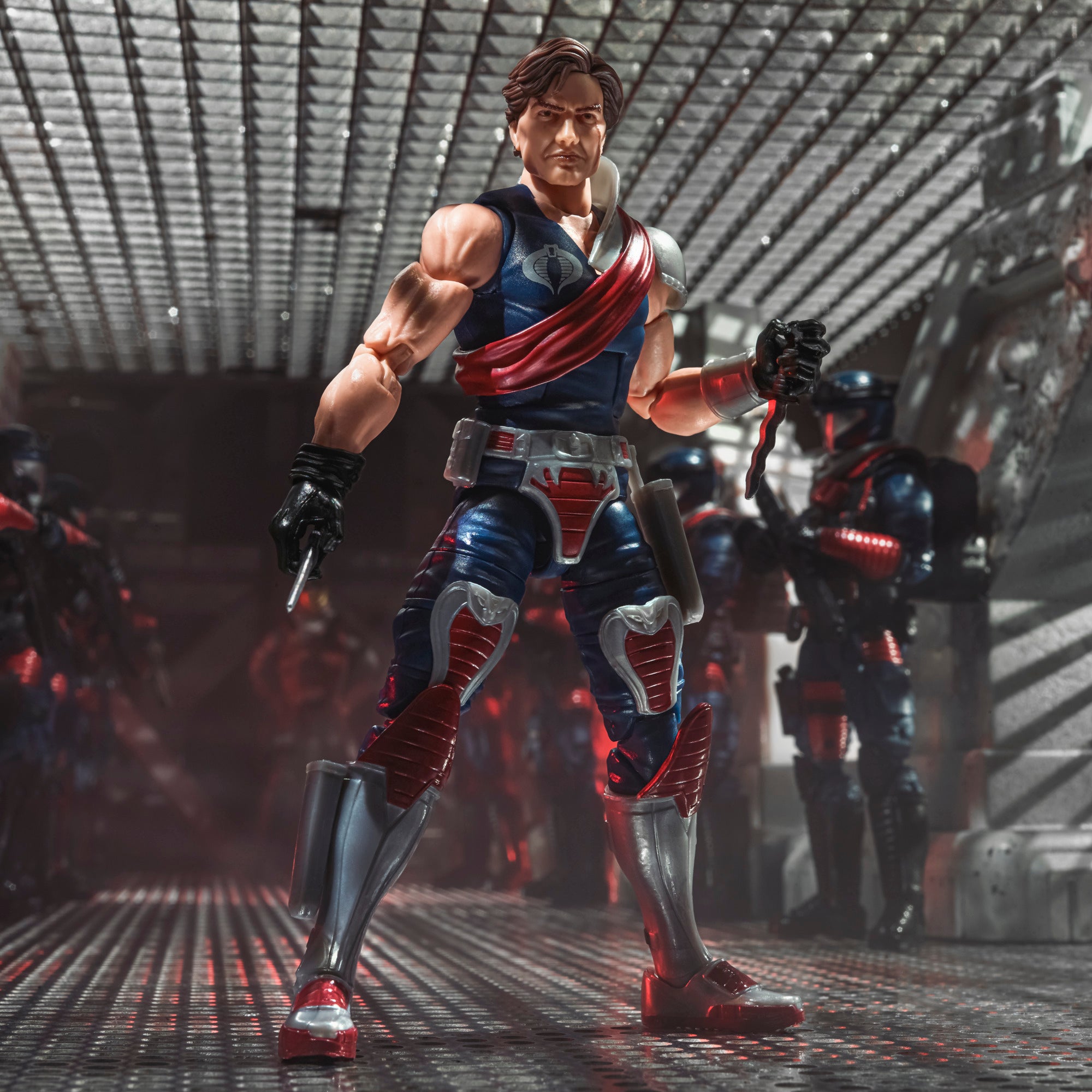 G.I. Joe Classified Series Xamot Paoli commanding Cobra troopers in corridor diorama holding SMG with army of Crimson Guards behind him