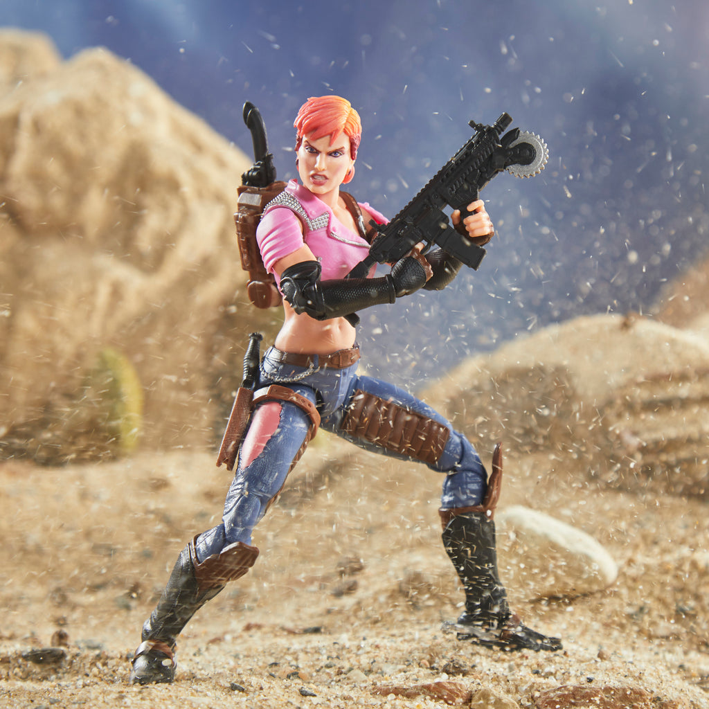 G.I. Joe Classified Series Zarana dynamic desert diorama pose holding saw-blade rifle with sand and debris flying around her