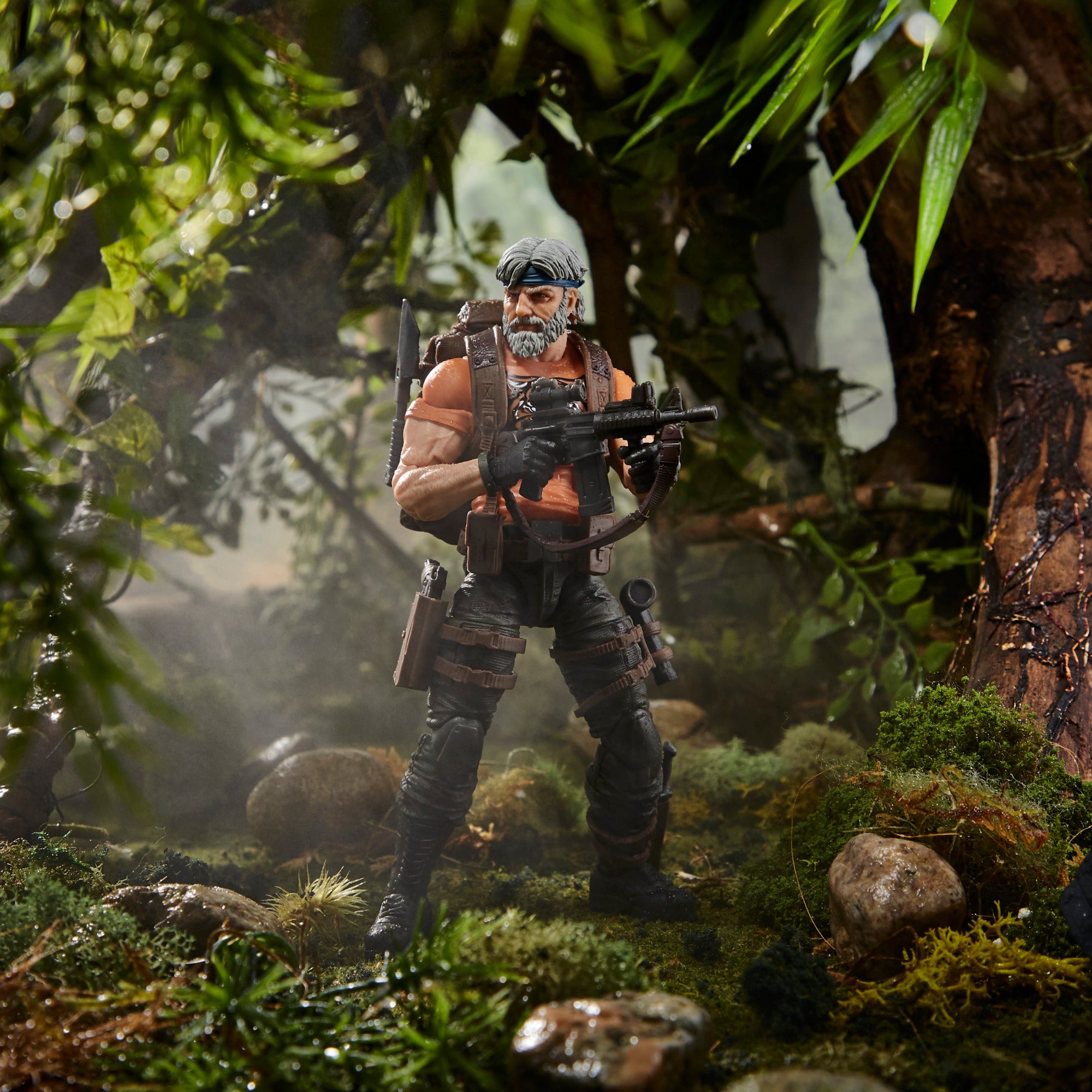 G.I. Joe Classified Series Outback Selkirk close-up portrait in rain holding knife and pistol showing tiger shirt detail