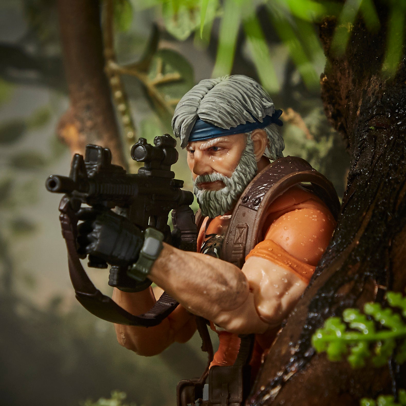 G.I. Joe Classified Series Outback Selkirk side profile kneeling in misty jungle ruins aiming pistol with backpack and shovel