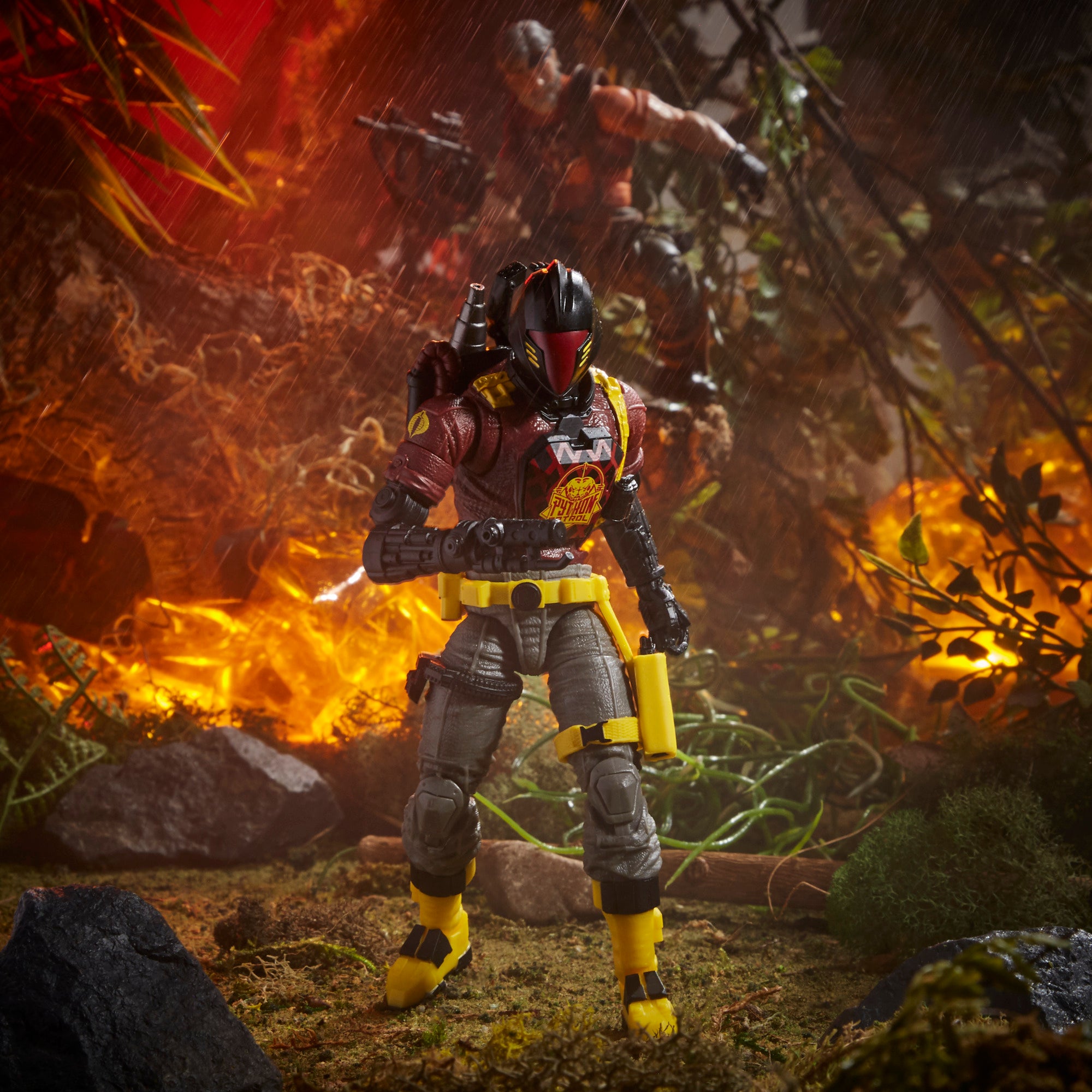 G.I. Joe Classified Series Python Patrol B.A.T. standing in jungle fire diorama with Python Patrol chest insignia visible
