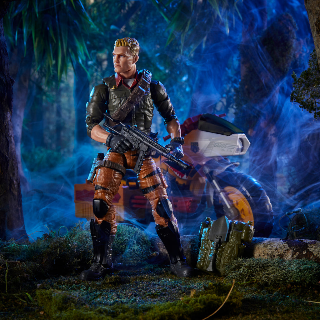 G.I. Joe Classified Series Tiger Force Duke leaning on RAM cycle in jungle diorama with blue atmospheric lighting