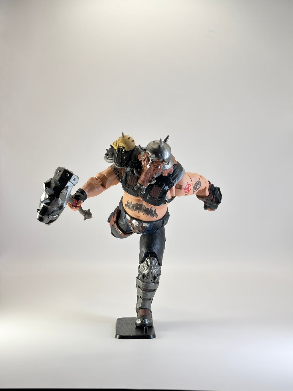 G.I. Joe Classified figure in a dynamic pose, mounted on a black display stand. Figure not included.