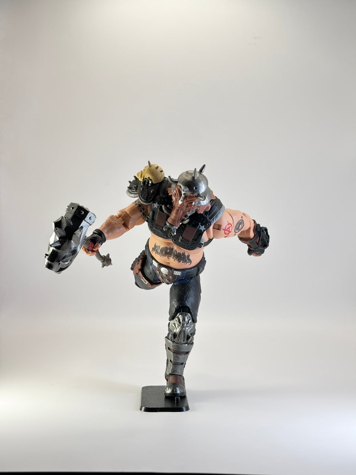 G.I. Joe Classified figure in a dynamic pose, mounted on a black display stand. Figure not included.