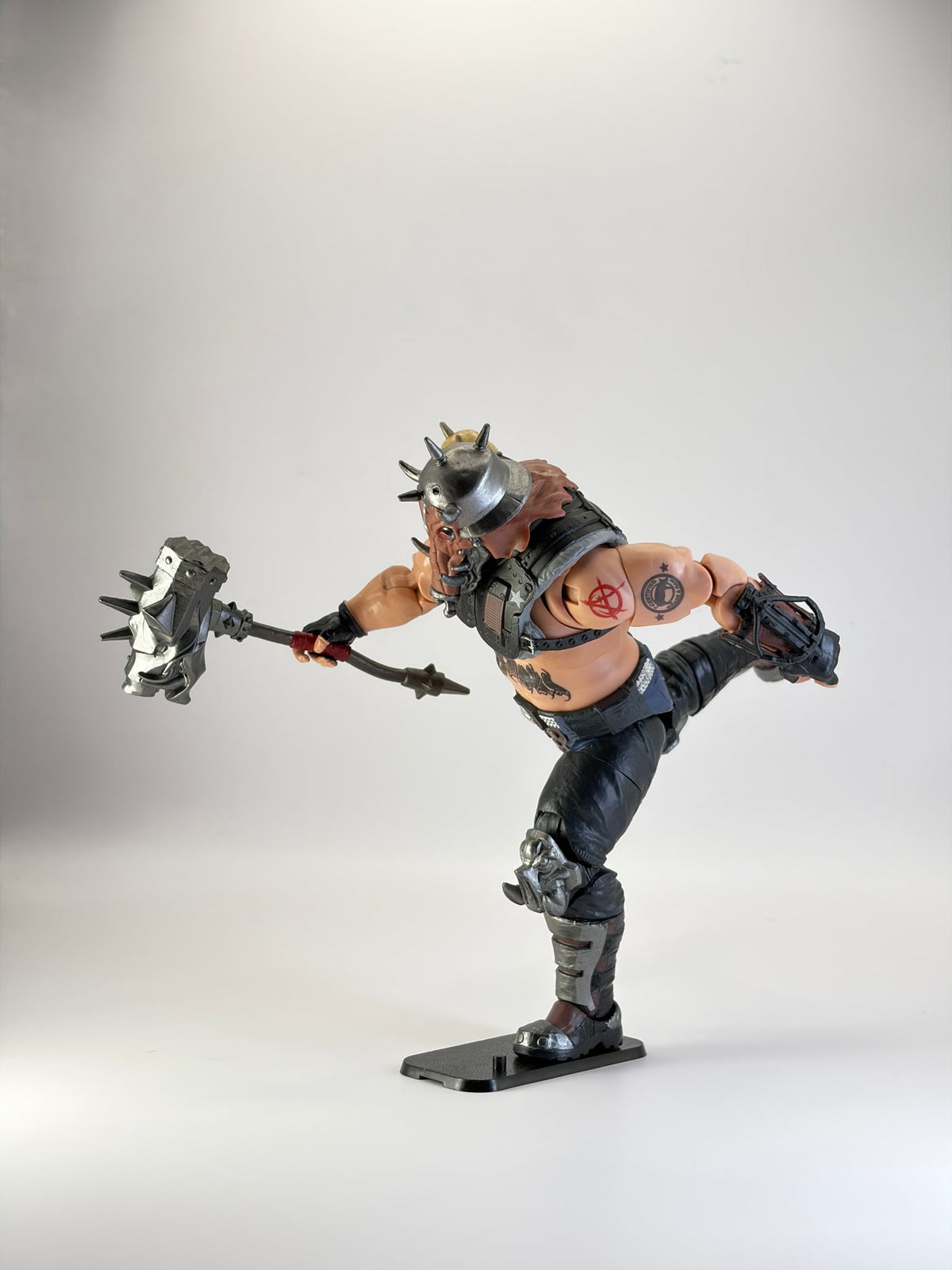 G.I. Joe Classified figure in a dynamic pose, mounted on a black display stand. Figure not included.