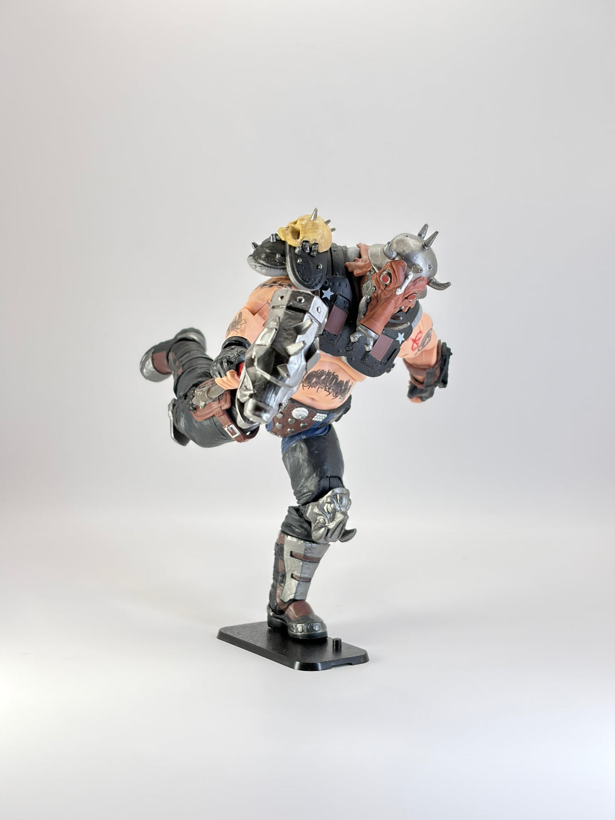 G.I. Joe Classified figure in a dynamic pose, mounted on a black display stand. Figure not included.
